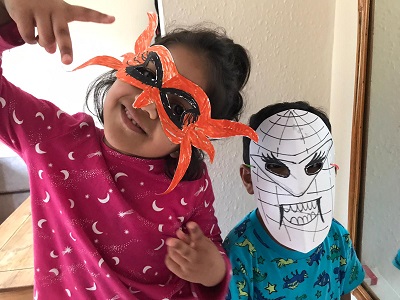 Children wearing home made masks