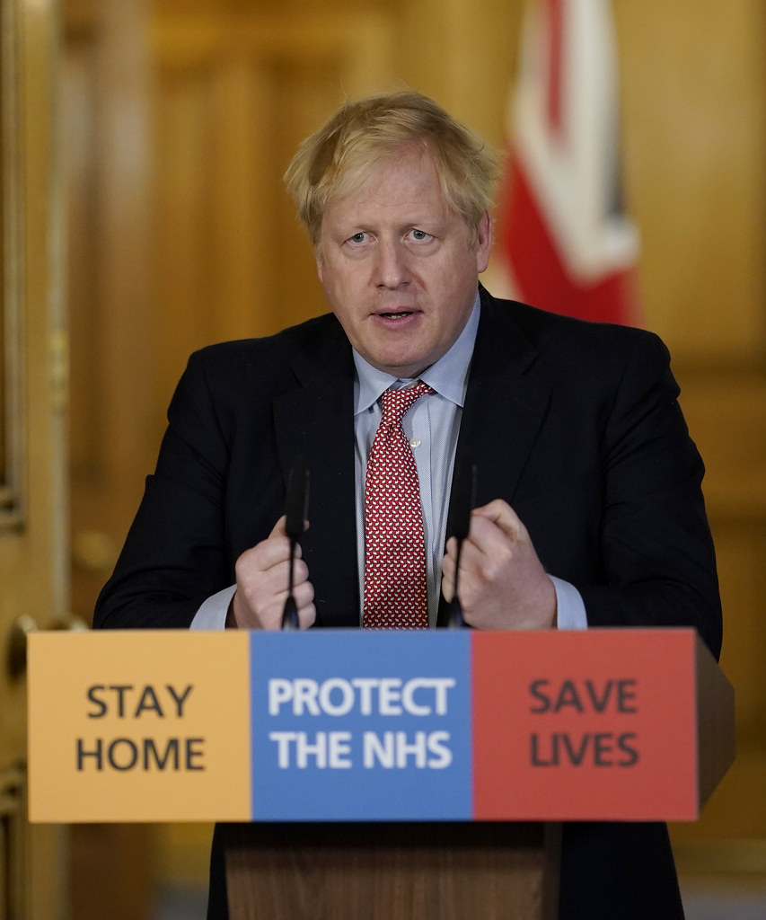 Photograph of UK Prime Minister Boris Johnson speaking at a COVID-19 press conference