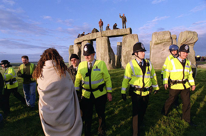 Police move to evict revellers at Stonehenge, Wiltshire, after a large number of people converged on the site to view the sunrise, during the celebration of the summer solstice Picture by: WILLIAMJ JAY WILLIAMS/PA Archive/PA Images