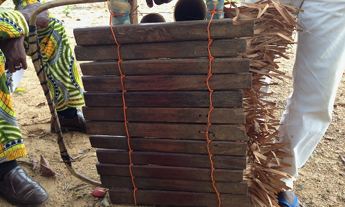 Portable xylophone with gourd resonators (Hilaire Amoah Onana