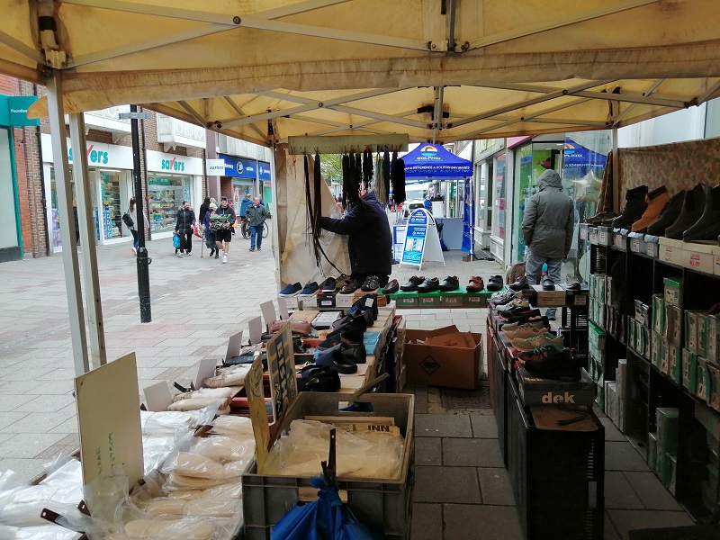 Market stalls with rain cover