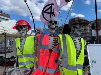 skeletons wearing hi-vis jackets