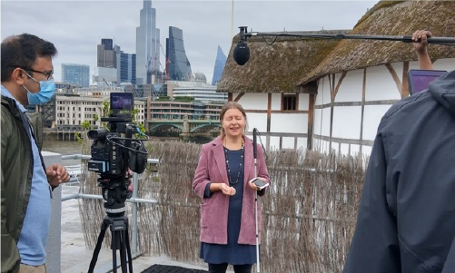 Hannah Thompson standing outside the Globe