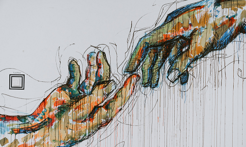 Colourful hands touching Copyright: © Claudio Schwarz on Unsplash