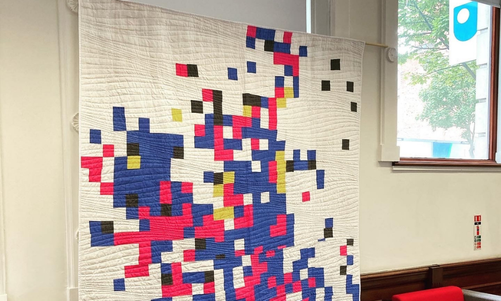 Quilt representing maps of segregation in Belfast 