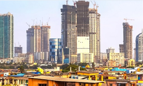 A cityscape showing different stages of development with skyscrapers and wooden huts