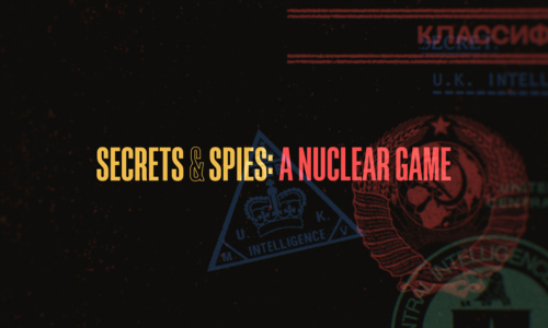 : title logo Secrets and Spies A Nuclear Game over laid on a black background with KGB and UK Intelligence emblems