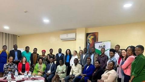 Dr Georgina Holmes with members of Rwandan civil society at a gender café organised by RWAMREC, a Rwandan NGO specialising in transforming masculinities. (Copyright: Georgina Holmes)