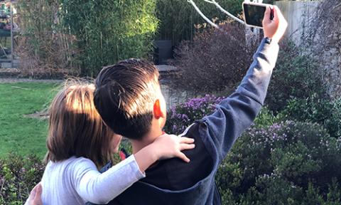 Kids taking a selfie