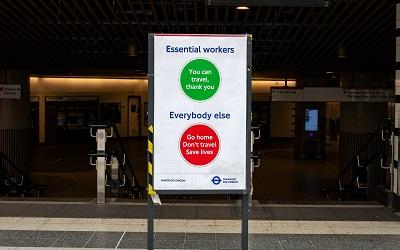 Sign on the London underground reminding people not to travel