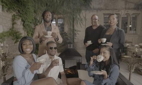 The six black British participants of We Are Black and British sharing cups of tea. Copyright Cardiff Productions