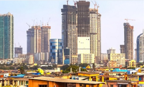 A cityscape showing different stages of development with skyscrapers and wooden huts