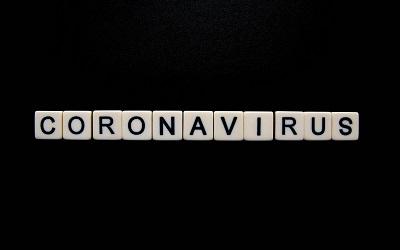 Scrabble letters spelling out coronavirus