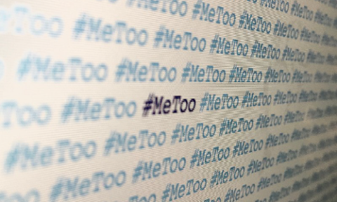 Multiple lines of hashtag-metoo across the computer screen