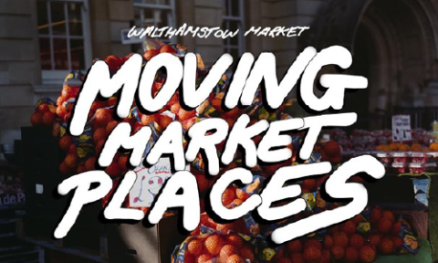 Picture of a cart of oranges with the words moving market places over the top