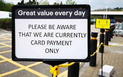 A sign reminding customers they can only use cards